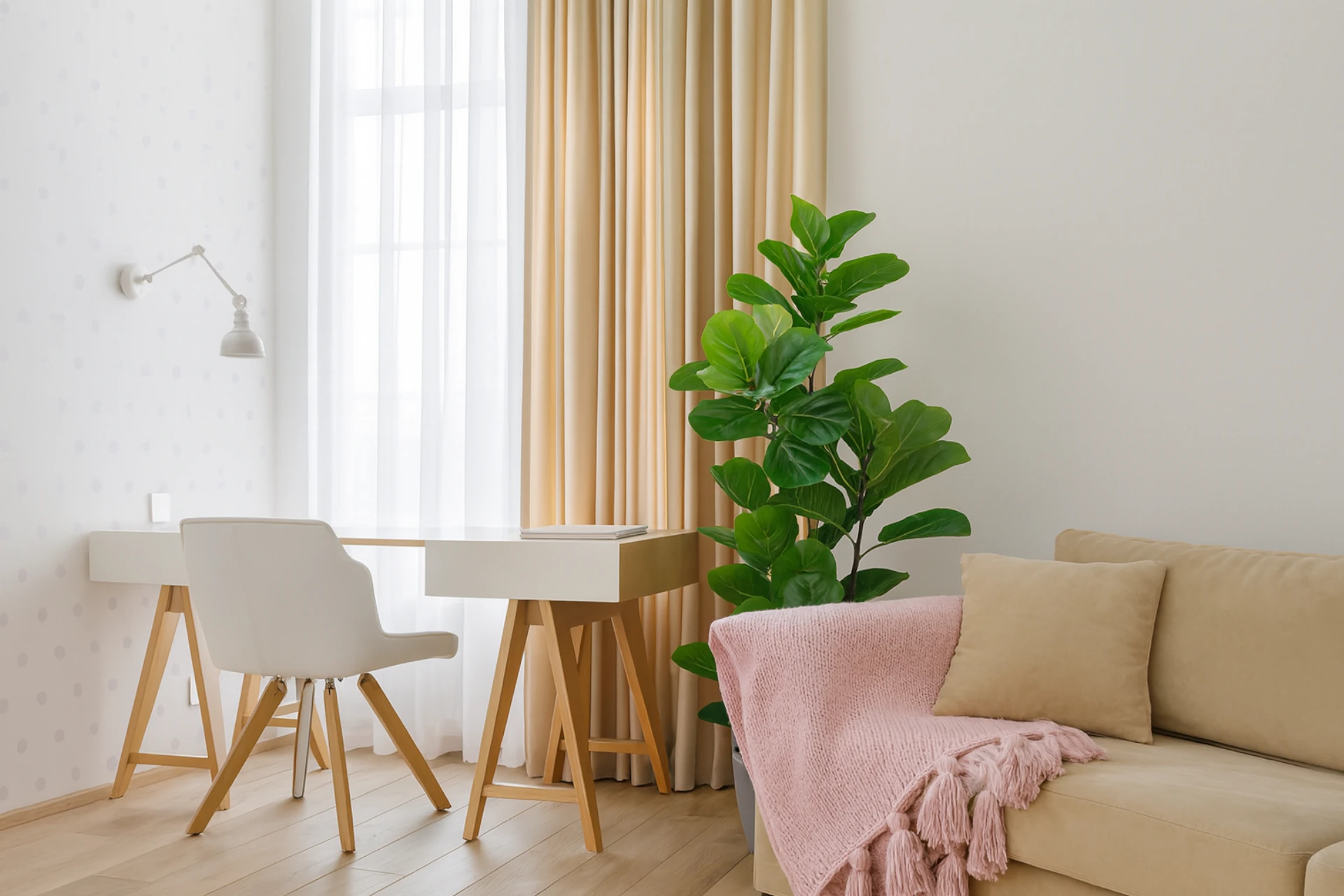 Sun coming through light made-to-measure curtains in study